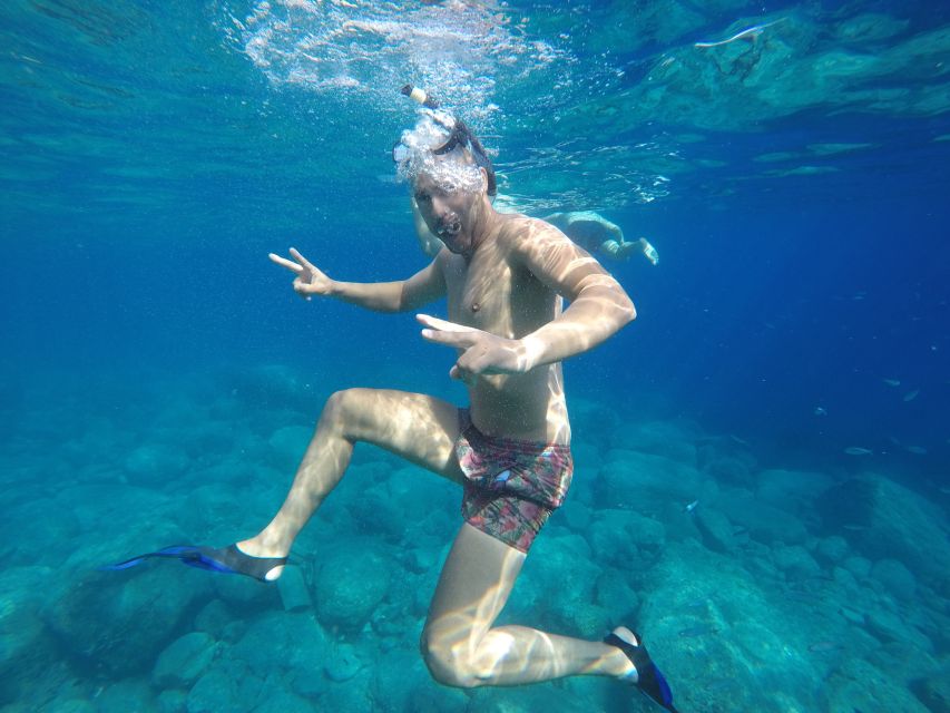Puerto de Mogan: Boat and Snorkeling Trip - The Tasarte coast, one hour of cliffs and open water