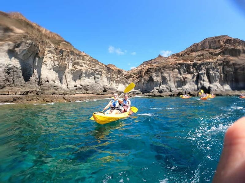 Puerto Mogán: Guided Adventure Kayak Tour in Caves & Snorkel - Paddling along the volcanic cliffs