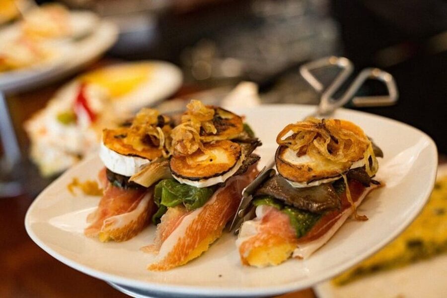 San Sebastian Food Tour: Pintxo Tasting Paired with Wines - Stop five: a final bite and local liqueur