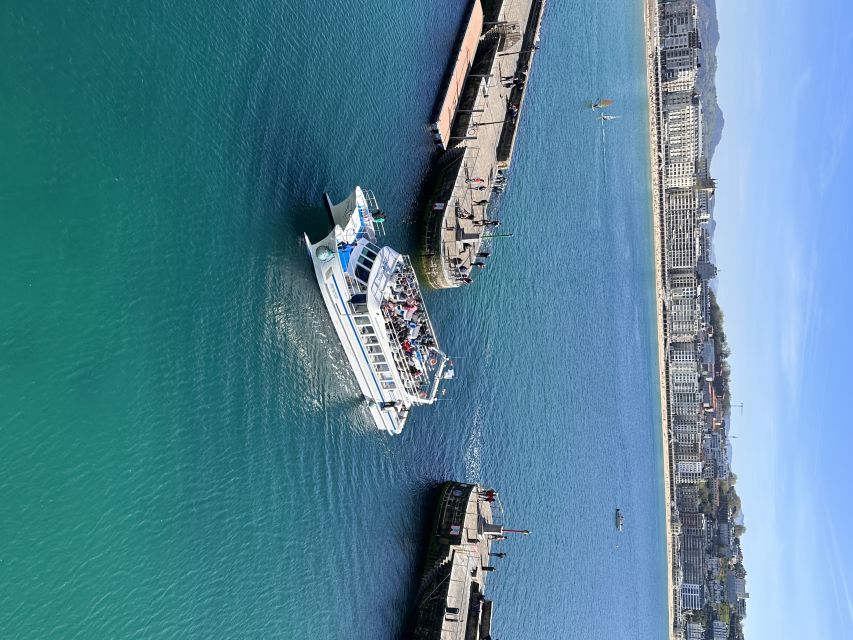 San Sebastian: Sustainable Catamaran Cruise with Audio Guide - Boarding at the traditional harbor