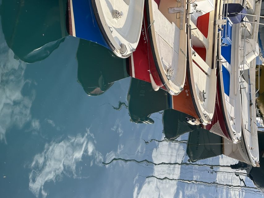 San Sebastian: Sustainable Catamaran Cruise with Audio Guide - Miramar Palace and the Paseo Nuevo seawall