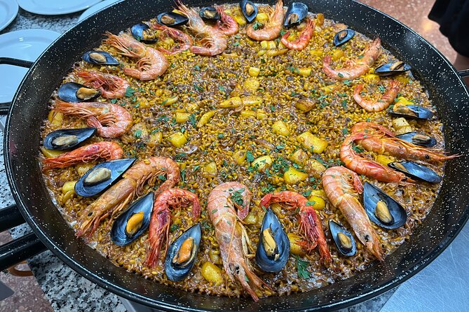Seafood paella cooking class, tapas and visit to Ruzafa market. - What the price and schedule really mean