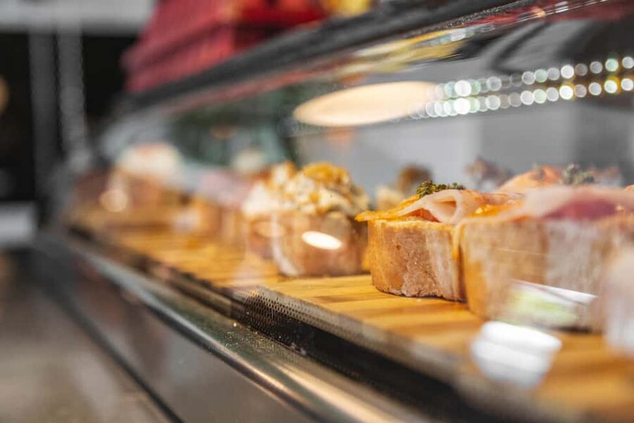 Secret Food Tours Madrid - Stop two: Iberian ham at a deli with 180 years of history