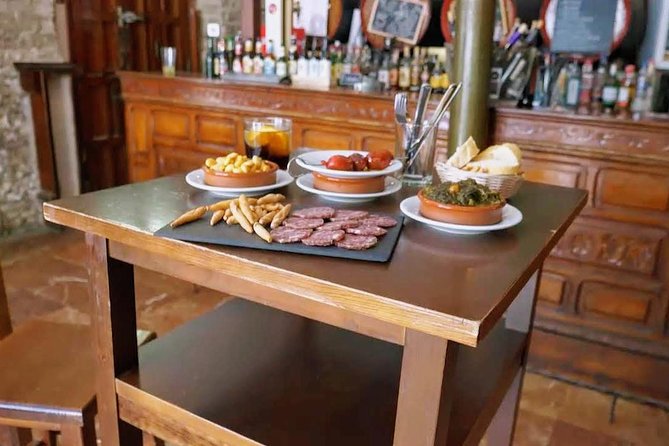 Sevilla Food Tour: Tapas, Wine, History & Traditions - Four wines, a full meal, and fair value