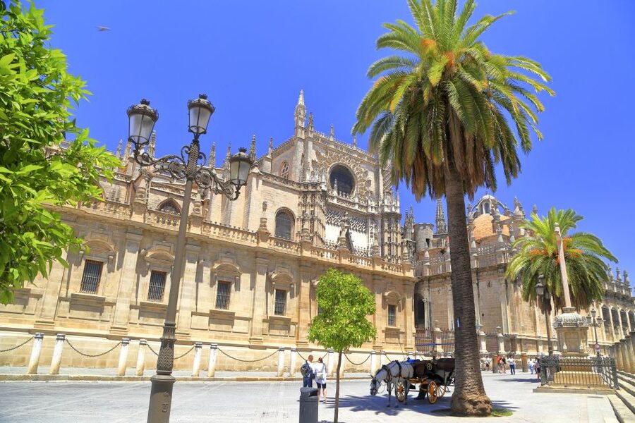 Seville: Cathedral, Giralda & Alcazar Entry With Guided Tour - Inside Seville Cathedral: scale, faith, and layered design