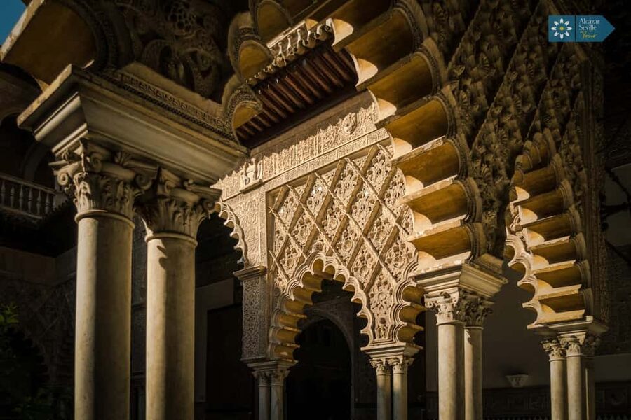 Seville: Cathedral, Giralda, and Royal Alcázar Guided Tour - Climbing the Giralda for Seville views