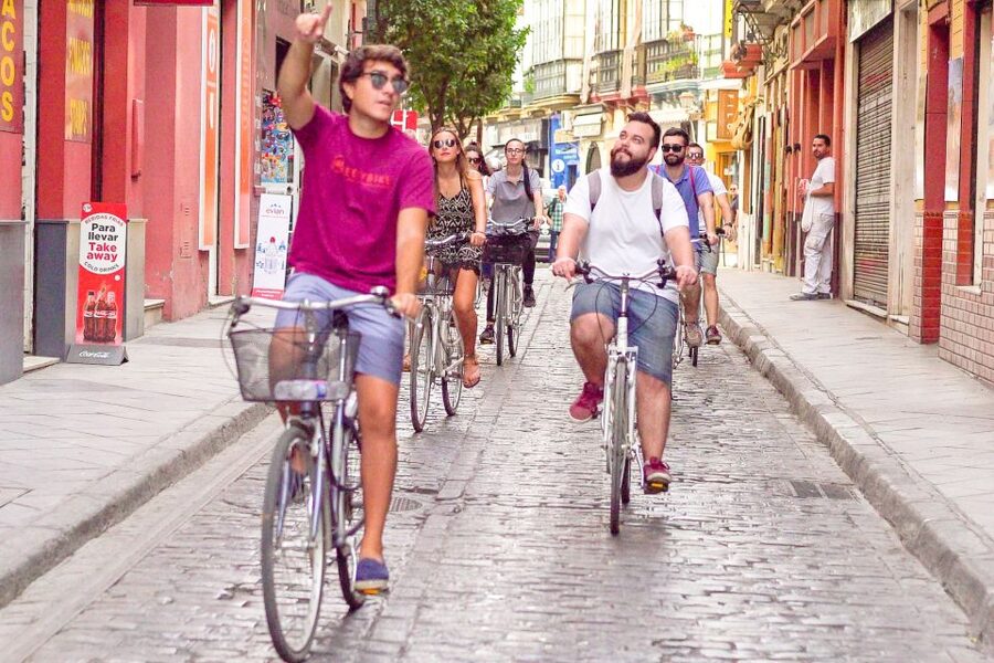 Seville: City Sightseeing and Local Culture Bike Tour - Starting inside Mercado del Arenal