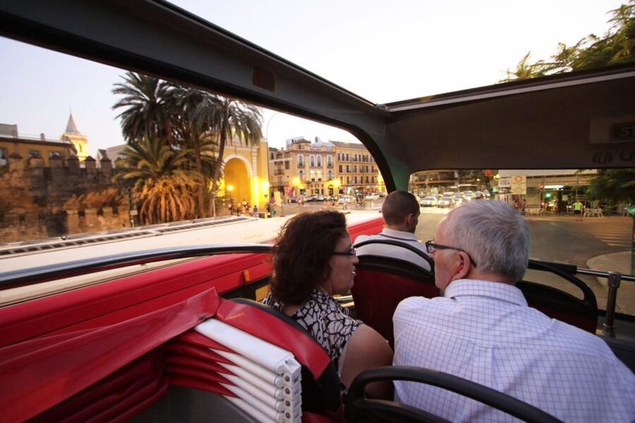 Seville: City Sightseeing Hop-On Hop-Off Bus Tour - Audio commentary, comfort, and boarding