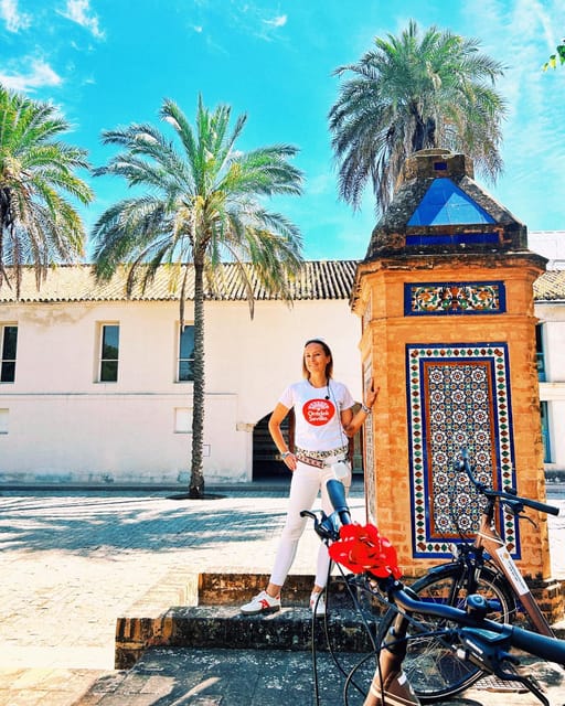 Seville: Dutch Cycling Highlights Tour with local guide - Crossing into Triana for a different side of Seville