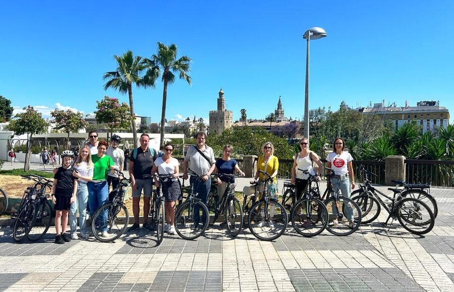 Seville: Dutch Highlights Tour - Crossing toward Triana and the Plaza de Toros