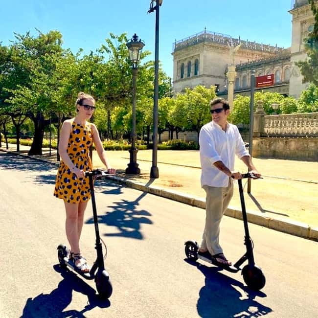 Seville: Electric Bike City Tour - Crossing Puente de Isabel II into Triana