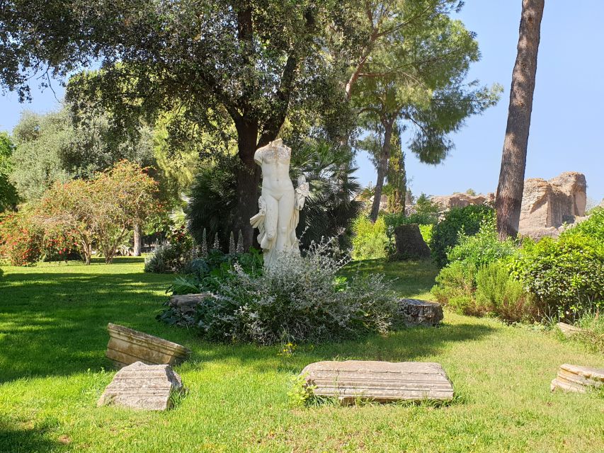Seville: Italica Roman Ruins City Tour - Mosaics and the small details that reward patience