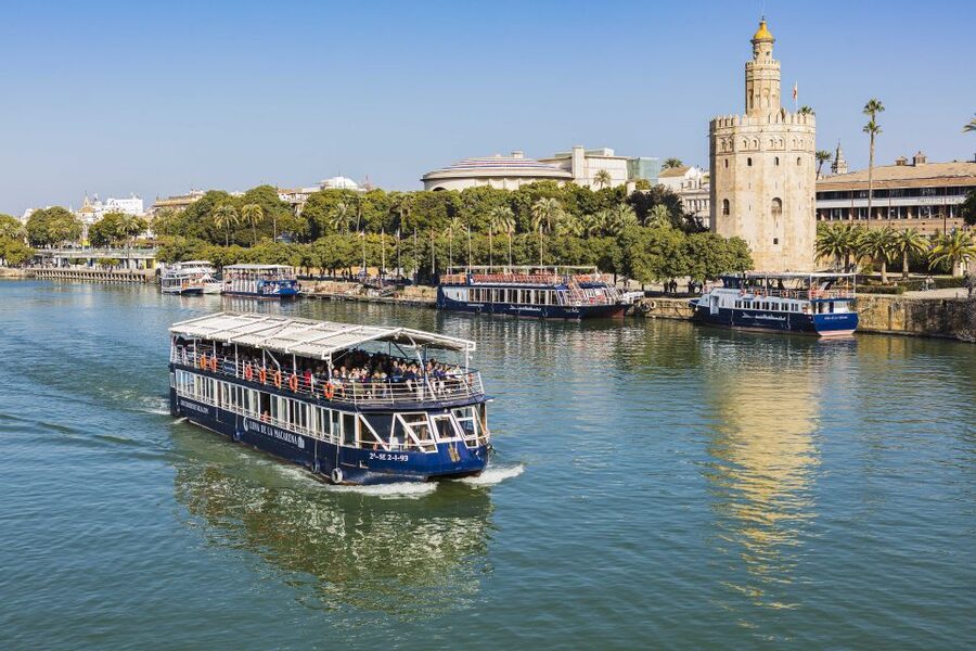 Seville: Panoramic Cruise, Hop-On-Hop-Off Bus & Walking Tour - Starting at Torre del Oro and sorting out the tickets