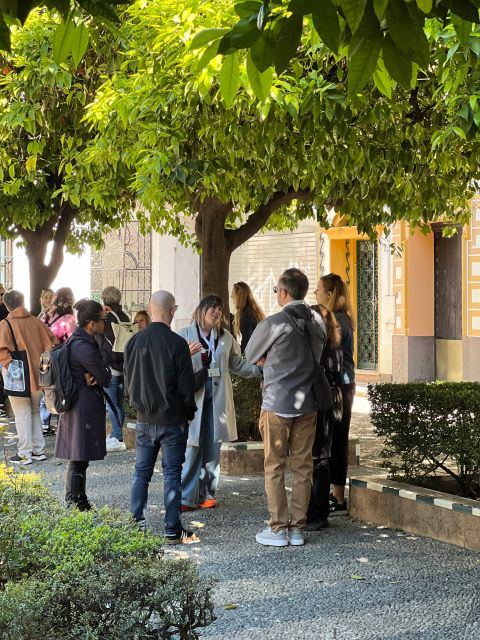 Seville: Small Group Jewish Quarter Tour with Tapas & Drinks - Calle Agua and the old palace wall