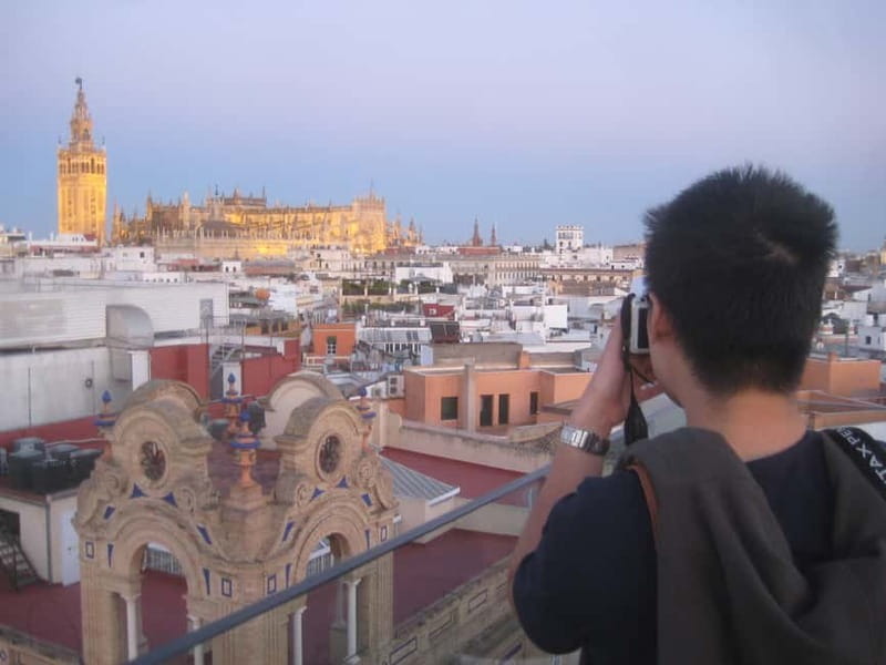 Seville: Sunset Roof Top Walking Tour - The Cathedral and La Giralda from rooftop height