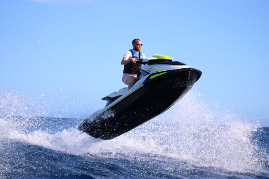 Tenerife: Jet Ski Guided Tour with Optional Photo Service - The swimming stop breaks up the speed