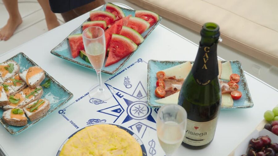 Tenerife: Shared Yacht Cruise with Champagne and Tapas - La Caleta for swimming, snorkeling, and water play