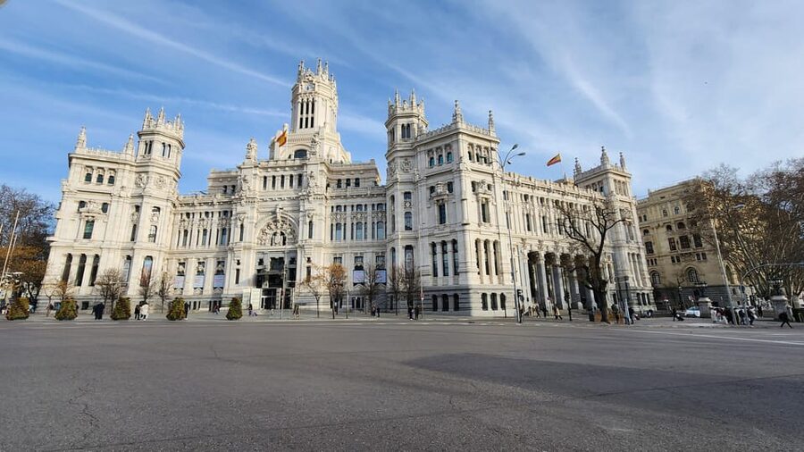 Tour Madrid: Secrets in a Electric Tuk Tuk - Starting at the Stock Exchange and Hotel Ritz