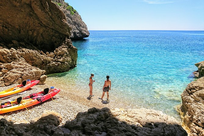 Uncharted Caves & Snorkelling Heaven: Cala Granadella Kayak Tour - Entering Cueva del Llop Marí