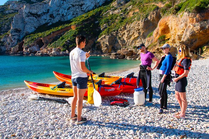 Uncharted Caves & Snorkelling Heaven: Cala Granadella Kayak Tour - Paddling along Playa de la Granadella