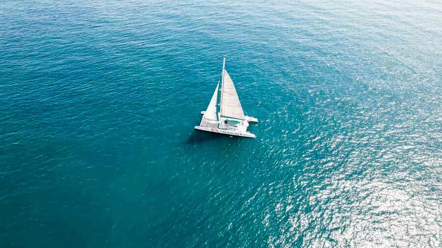 Valencia: Catamaran Cruise with Swimming & Optional DJ - Sunbathing on the catamaran’s front net